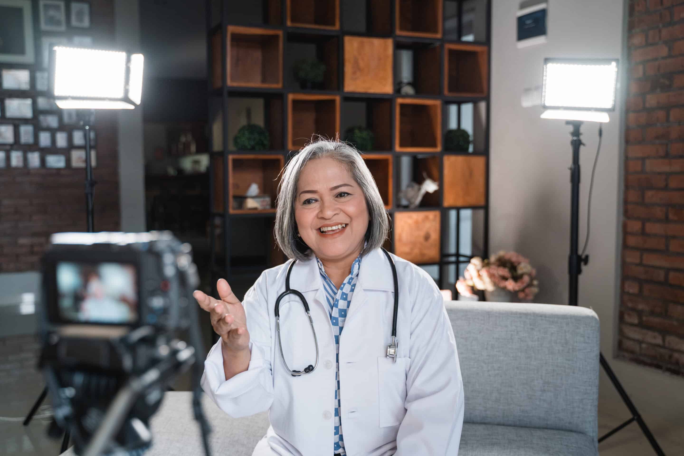 hand pointing at computer screen