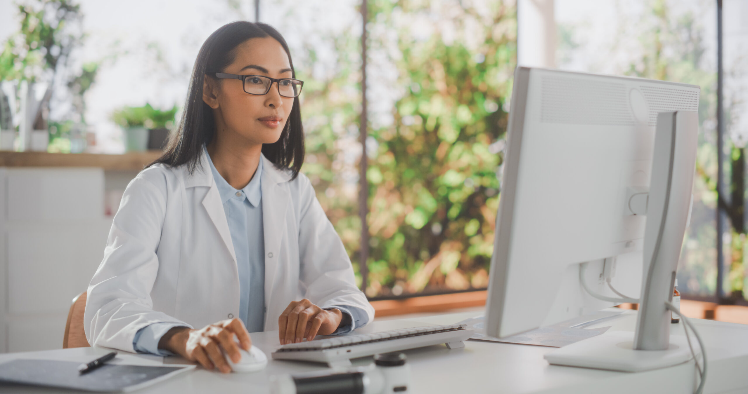 Doctor using computer. Podiatrist using website concept of Podiatry web design Doctor using computer. Podiatrist using website concept of Podiatry web design